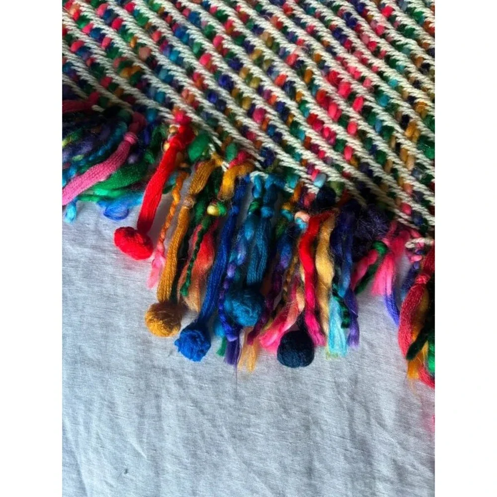 Colorful woven throw blanket with tassels/fringe